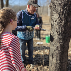Attendees took part in maple syrup tapping during our first middle school retreat at Richardson Nature Center.